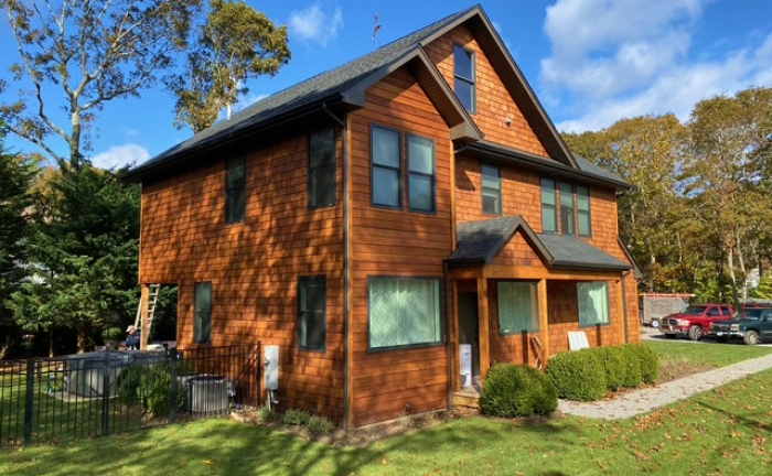 Natural cedar home after restoration 1